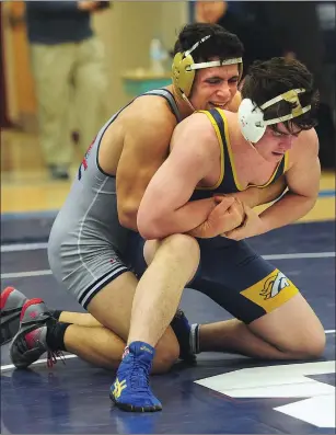  ?? File photo by Ernest A. Brown ?? Lincoln’s Tyler Balon (back) comes into Saturday’s Gorman Invitation­al with just one loss in the 182pound weight class. Burrillvil­le’s Greg Lacroix has only suffered one defeat this season. The two could meet again Saturday at Cumberland’s Wellness...