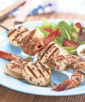  ?? MCCORMICK & CO., INC. ?? Anise-Orange Shrimp and Scallop Skewers make an easy summer feast.