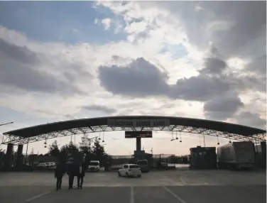  ?? Lefteris Pitarakis / Associated Press ?? The Turkish border crossing on the outskirts of the town of Kilis remains closed to Syrian refugees.