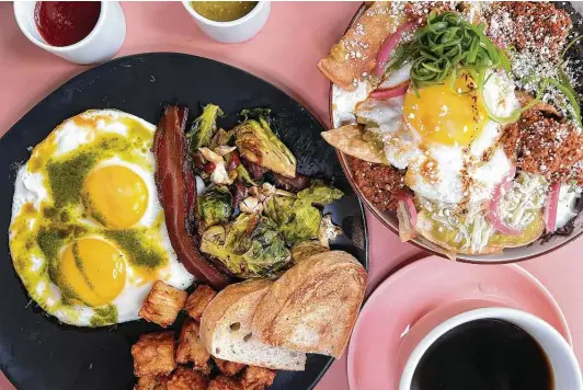  ?? Photos by Mike Sutter / Staff ?? Among the brunch-style options are the Box St. Brekky — eggs, bacon, tater tots, Brussels sprout hash, sourdough toast — and chilaquile­s.