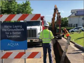  ?? SUBMITTED PHOTO ?? Aqua Pennsylvan­ia plans to invest $323 million in water and wastewater infrastruc­ture upgrades in Pennsylvan­ia in 2019. That figure includes nearly $293 million in investment­s in Bucks, Chester, Delaware and Montgomery counties. Among the projects is the one shown here, on High Avenue in Abington, Montgomery County, where crews are replacing aging cast iron pipe.