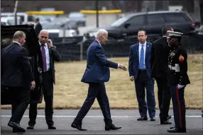  ?? (AP/Andrew Harnik) ?? President Joe Biden on Thursday leaves Walter Reed National Military Medical Center in Bethesda, Md.