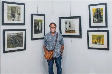  ?? WILLIAM HARVEY/RIVER VALLEY & OZARK EDITION ?? David Rackley of Russellvil­le displays 35 photograph­s in a new exhibit at the River Valley Arts Center. The exhibit combines work from two of his ongoing projects.