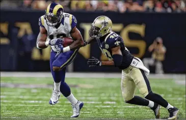  ?? GETTY IMAGES ?? Saints cornerback Delvin Breaux (40) needs surgery for a fractured fibula. Coach Sean Payton said he was pushing Breaux to get back to practice after the team’s orthopedic surgeons misdiagnos­ed the injury as a contusion.