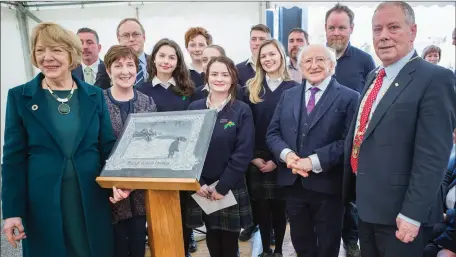  ??  ?? St Mary’s Secondary School presented a special gift of stonework of a figure on the banks of the river to President Higgins last Friday. Pic: Donal Hackett.