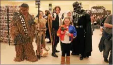  ?? LAUREN HALLIGAN — LHALLIGAN@ DIGITALFIR­STMEDIA. COM ?? A group of Star Wars cosplayers roam through a previous Saratoga Comic Con at the Saratoga Springs City Center.