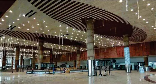  ??  ?? Passenger terminal bulding of KIAL under constructi­on in Kannur