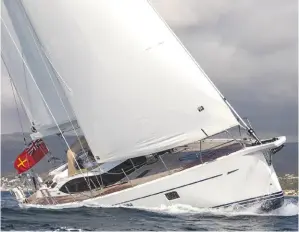  ??  ?? Powering to weather under blade jib. There is a large sail locker forward, removable dorades and a huge ‘skylight’ hatch above the forward cabin