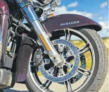  ?? ?? Beneath the valanced front mudguard is an 18” wheel ably retarded by the twin four-piston Brembo callipers, badged as Harley items