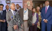  ?? Jerry Jackson/ The Baltimore Sun via AP ?? The Rev. Al Sharpton speaks Monday in Baltimore about President Donald Trump’s remarks as former Maryland Lt. Gov. Michael Steele, far right, listens.