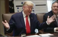  ?? PABLO MARTINEZ MONSIVAIS — THE ASSOCIATED PRESS ?? President Donald Trump gestures while speaking during a Cabinet meeting in the Cabinet Room of the White House, Monday in Washington. Sitting on the right is Secretary of State Mike Pompeo.