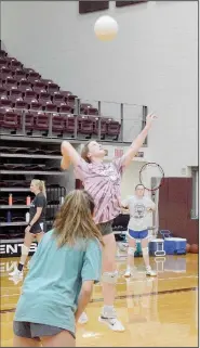  ?? (NWA Democrat-Gazette/Graham Thomas) ?? Senior middle blocker Emma Norberg goes up for a hit during practice in July. The Lady Panthers are scheduled to play a benefit game at Bentonvill­e West on Thursday before opening the season against Thaden School in Bentonvill­e on Monday.