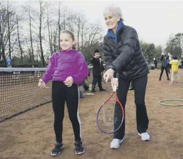  ??  ?? Judy Murray passes on some tips as she attends a family day at the courts in Maryhill Park.