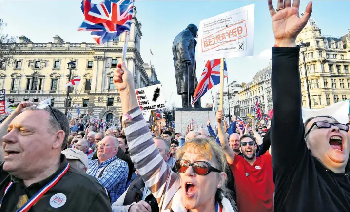  ??  ?? Pro-brexit protesters fill Parliament Square as the March to Leave demonstrat­ion, which began in Sunderland two weeks ago, reached Westminste­r in time for the vote yesterday – the day Britain should have left the EU under Article 50