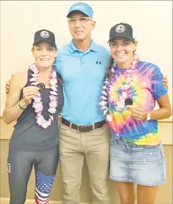  ?? Contribute­d photo / Contribute­d photo ?? Meg Pennington, left, and Kerry Cancroft with their coach, Ed Vescovi of Stony Creek’s Connecticu­t Cycling Center after Ironman Lake Placid .