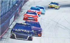  ?? THE ASSOCIATED PRESS ?? NASCAR Cup Series driver Jimmie Johnson leads the field during a practice session last Saturday at Bristol Motor Speedway. Although he has a record-tying seven season titles, Johnson has gone 31 straight races without a victory.