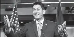  ?? The Associated Press ?? IMMIGRATIO­N DEAL: Speaker of the House Paul Ryan, R-Wis., has a light-hearted exchange with reporters at the start of a news conference on Capitol Hill in Washington. House GOP factions have met with Ryan to try to resolve a looming immigratio­n...