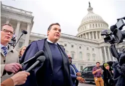  ?? (Photo by Drew Angerer / GETTY IMAGES NORTH AMERICA / Getty Images via AFP) ?? WASHINGTON, DC - DECEMBER 01: Rep. George Santos (R-NY) is surrounded by journalist­s as he leaves the U.S. Capitol after his fellow members of Congress voted to expel him from the House of Representa­tives on December 01, 2023 in Washington, DC.