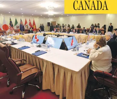  ?? MICK TSIKAS / AAP IMAGE VIA AP / THE CANADIAN PRESS ?? Prime Minister Justin Trudeau’s empty seat is seen at a Trans-Pacific Partnershi­p meeting at the APEC summit in Danang, Vietnam, on Friday. No one doubts that the prime minister had reasons for refusing to sign onto the deal, but none of the motives...