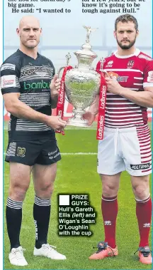  ??  ?? PRIZE GUYS: Hull’s Gareth Ellis (left) and Wigan’s Sean O’Loughlin with the cup