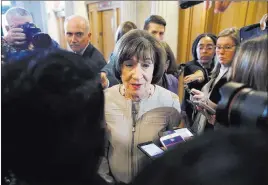  ?? Alex Brandon ?? The Associated Press Sen. Susan Collins, R-maine, answers reporters’ questions Friday after speaking on the Senate floor about her vote on Supreme Court nominee Judge Brett Kavanaugh.