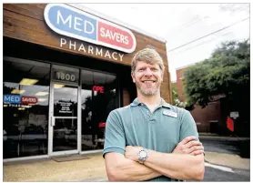  ?? PHOTOS BY SHELBY TAUBER / AMERICAN-STATESMAN ?? MedSavers owner Chris Johnson keeps his costs down by not accepting insurance. “When 80 percent of your phone time is taken up by insurance, it takes staffff to do that,”said
Johnson, a 1995 University of Texas graduate.