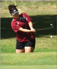  ?? RECORDER CHIEKO HARA ?? PHOTO BY Granite Hills High School’s Nathalie Saldivar makes an approach shot near eighth green Tuesday, Oct. 16, at the East Sequoia League championsh­ip at River Island Country Club.