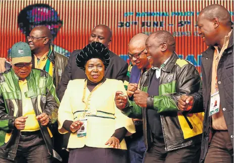  ?? /Masi Losi ?? Unity in dance: ANC president Jacob Zuma, left, and his deputy Cyril Ramaphosa, second right, dance with Nkosazana Dlamini-Zuma at the end of the ANC national policy conference held at Nasrec, Johannesbu­rg, in August.