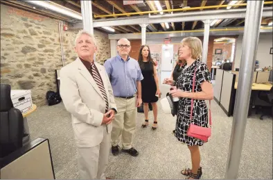  ?? Hearst Connecticu­t Media file photo ?? Norwalk Mayor Harry Rilling, left, tours 41 N. Main St., alongside Timon Malloy of Fred F. French Investing in 2016.