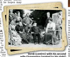  ??  ?? Verdi (centre) with his second wife Giuseppina (seated to his right)