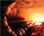  ?? ?? Hope in the darkness: A child in Mariupol