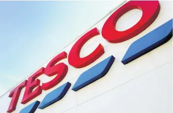  ??  ?? > Supermarke­t giant Tesco’s £3.7bn takeover of the Booker wholesale group was given the all-clear by the Competitio­n & Markets Authority in 2017