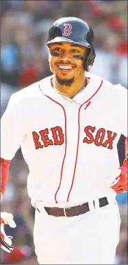  ?? Tim Bradbury / Getty Images ?? Boston’s Mookie Betts celebrates after hitting a solo home run on Wednesday.