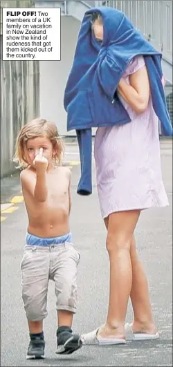  ??  ?? FLIP OFF! Two members of a UK family on vacation in New Zealand show the kind of rudeness that got them kicked out of the country.