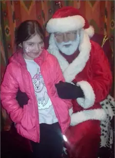  ??  ?? Caitlin, from Wexford town, pictured with Santa.