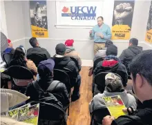  ?? CONTRIBUTE­D ?? Santiago Escobar, a national representa­tive for United Food and Commercial Workers Canada, facilitate­d a workshop for migrant farm workers. UFWC Canada released a report Monday calling for reforms at the federal and provincial levels to better protect migrant workers.