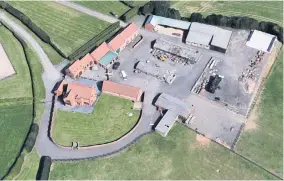  ??  ?? >
£1.5 million Tidbury Castle Farm, near Coventry, which has been damaged by subsidence caused by a mine shaft from Daw Mill Colliery