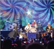  ?? LAUREN HALLIGAN — LHALLIGAN@DIGITALFIR­STMEDIA.COM ?? Ringo Starr walks on stage to perform with his All-Starr Band on Friday at Saratoga Performing Arts Center in Saratoga Springs.