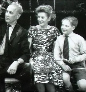  ??  ?? The wrong fit: Jane, as a boy, with her GP father Andrew and mother Peggy. Inset: Happy in her own skin today