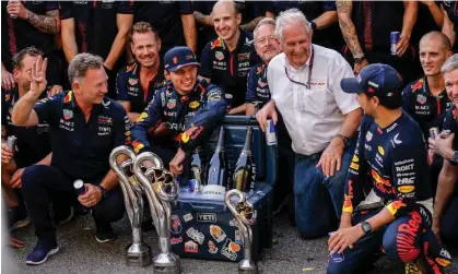  ?? Photograph: Xavi Bonilla/DPPI/ Shuttersto­ck ?? Christian Horner (left) celebrates Max Verstappen’s victory in Monza with his drivers and support team.