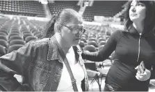  ??  ?? Disappoint­ed to tears, Erlinda Roque, left, is comforted by Unifor union rep Kara Boyes seconds after hearing the results of Friday’s failed ratificati­on vote. “There is no perfect thing in life,” says Roque.