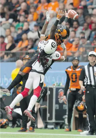  ?? DARRYL DYCK/THE CANADIAN PRESS ?? B.C. Lions receiver Shaq Johnson fails to make this reception as Ottawa defender Sherrod Baltimore gets a hand up during the first half in Vancouver on Saturday. The Redblacks were down by 19 points but managed to come back and win 30-25 for a crucial...