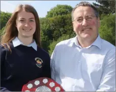  ??  ?? Junior Sports Person of the Year Breda Cushen with school principal Jay Murphy.