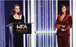  ??  ?? Actress Natalie Portman, recipient of the ‘Hollywood Actress Award’ for ‘Jackie’, (left) and presenter Susan Sarandon speak onstage.