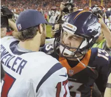  ?? AP PHOTO ?? PASSING THE TORCH: Broncos quarterbac­k Trevor Siemian greets Texans counterpar­t Brock Osweiler following last night’s game in Denver.