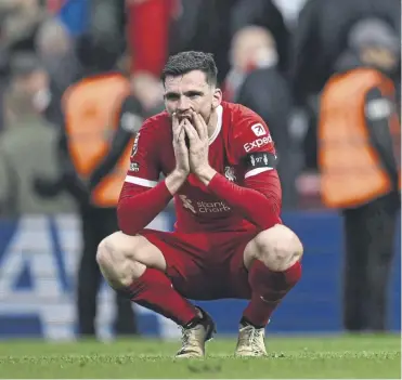  ?? ?? Scotland captain Andy Robertson slumps to the turf after Liverpool’s 1-0 defeat to Crystal Palace. Below, Ollie Watkins scored Aston Villa’s second against Arsenal