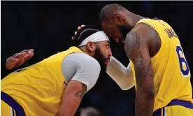  ?? Photograph: Gary A Vasquez/USA Today Sports ?? Lakers star LeBron James, right, consults with Anthony Davis during a stoppage in play against the Timberwolv­es on Friday night.