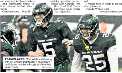  ?? Bill Kostroun ?? TEAM PLAYER: Mike White, celebratin­g with Ty Johnson (right) after a touchdown on Sunday, has the full support of the Jets locker room.