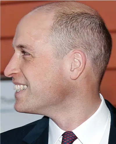  ??  ?? Crowning glory: William’s new haircut at Evelina London Children’s Hospital yesterday