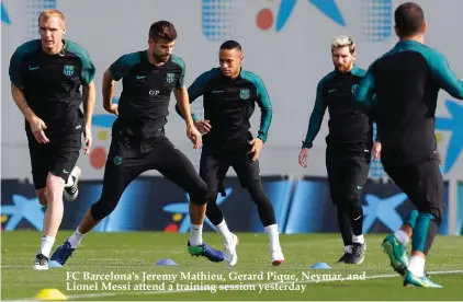  ??  ?? FC Barcelona's Jeremy Mathieu, Gerard Pique, Neymar, and Lionel Messi attend a training session yesterday